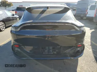 2021 Aston Martin DBX z VIN SCFVUJAWXMTV01292, wystawiony jako Copart lot #83824504 z przebiegiem Nie podano mil oraz Szkody całkowita. Historia ofert i sprzedaży dostępna na DreamBid. Obrazek 6.