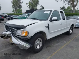 2000 Ford F-150 XL with VIN 1FTRX17L4YNA39407, listed as a IAAI auction lot 42141350 with 82,824 mi miles and . Bid and sale history available at DreamBid. Image 2.