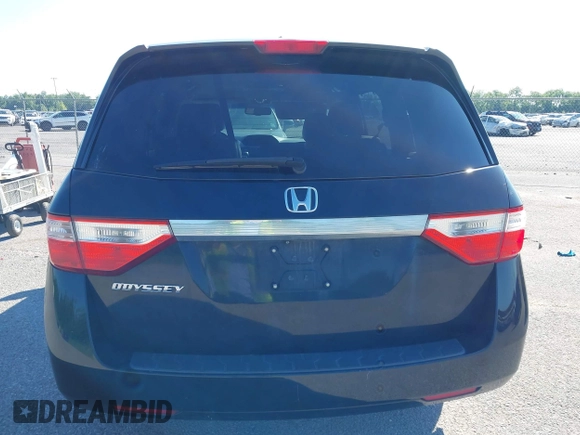 2011 Honda Odyssey EX-L with VIN 5FNRL5H66BB058333, listed as a IAAI auction lot 42172045 with 215,723 mi miles and . Bid and sale history available at carsss.com. Image 16.