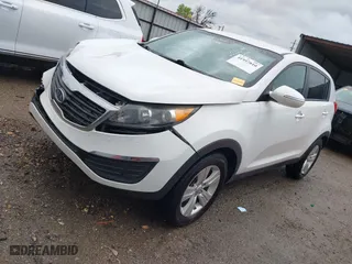 2012 Kia Sportage LX with VIN KNDPB3A2XC7283612, listed as a IAAI auction lot 41957810 with 165,899 mi miles. Bid and sale history available at carsss.com. Image 2.