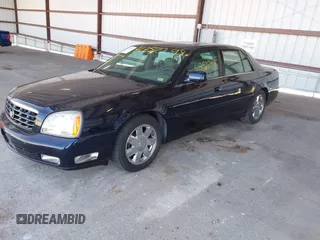 2004 Cadillac DeVille DTS z VIN 1G6KF57934U181654, wystawiony jako IAAI lot #41752298 z przebiegiem 131 861 mil mil oraz . Historia ofert i sprzedaży dostępna na DreamBid. Obrazek 2.