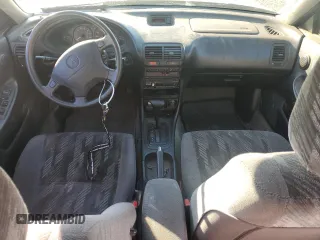 1998 Acura Integra LS with VIN JH4DB7659WS002591, listed as a Copart auction lot 84289584 with 316,458 mi miles and Salvage title. Bid and sale history available at DreamBid. Image 8.