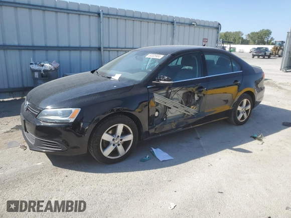 2014 Volkswagen Jetta TDI w/Premium with VIN 3VW3L7AJ2EM392016, listed as a Copart auction lot 69305904 with 111,903 mi miles and Salvage title. Bid and sale history available at DreamBid. Image 1.