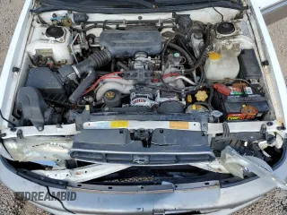 1999 Subaru Legacy Outback with VIN 4S3BG6850X7649578, listed as a Copart auction lot 56654155 with 174,651 mi miles and Salvage title. Bid and sale history available at DreamBid. Image 12.
