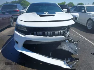 2021 Dodge Charger R/T z VIN 2C3CDXCT2MH597867, wystawiony jako IAAI lot #42212124 z przebiegiem 54 441 mil mil oraz . Historia ofert i sprzedaży dostępna na DreamBid. Obrazek 12.