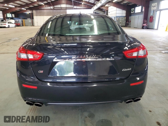 2015 Maserati Ghibli S Q4 with VIN ZAM57RTA3F1150242, listed as a Copart auction lot 61202585 with 21,271 mi miles and Salvage title. Bid and sale history available at DreamBid. Image 6.