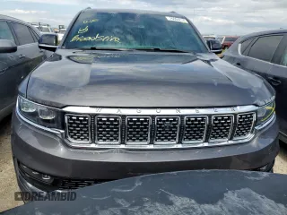 2023 Jeep Grand Wagoneer Series III z VIN 1C4SJVGP5PS512227, wystawiony jako Copart lot #76004214 z przebiegiem Nie podano mil oraz Szkoda całkowita • Salvage title. Historia ofert i sprzedaży dostępna na DreamBid. Obrazek 5.