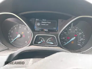 2018 Ford Focus SE z VIN 1FADP3F23JL225333, wystawiony jako IAAI lot #41758445 z przebiegiem 133 307 mil mil oraz . Historia ofert i sprzedaży dostępna na DreamBid. Obrazek 7.
