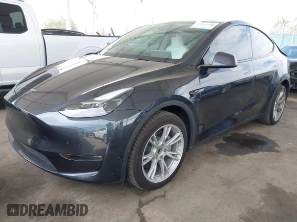 2024 Tesla Model Y Long Range z VIN 7SAYGDEE2RF069588, wystawiony jako IAAI lot #42024180 z przebiegiem 13 230 mil mil oraz . Historia ofert i sprzedaży dostępna na DreamBid. Obrazek 19.