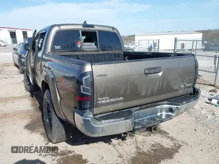 2015 Toyota Tacoma with VIN 5TFLU4ENXFX139145, listed as a IAAI auction lot 41822079 with 146,842 mi miles. Bid and sale history available at carsss.com. Image 3.