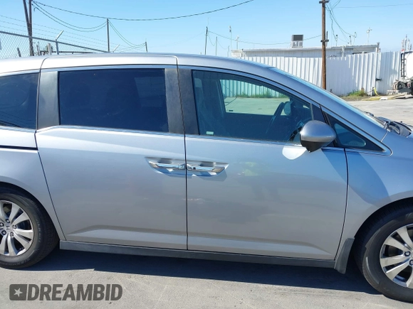 2016 Honda Odyssey SE with VIN 5FNRL5H32GB153002, listed as a IAAI auction lot 42084022 with 63,764 mi miles and . Bid and sale history available at DreamBid. Image 13.