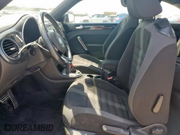 2012 Volkswagen Beetle with VIN 3VWV87AT7CM610251, listed as a Copart auction lot 52852395 with 77,550 mi miles and Salvage Title. Bid and sale history available at DreamBid. Image 7.