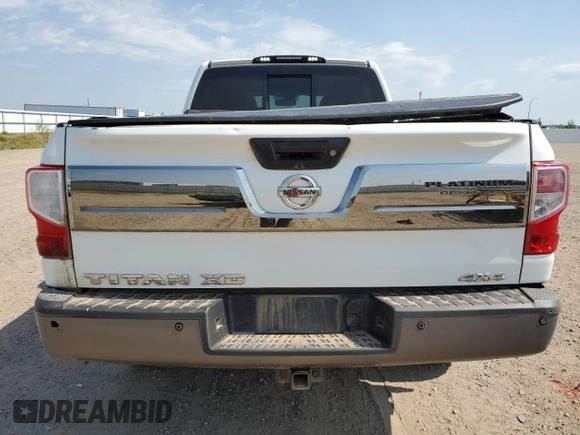 2016 Nissan Titan XD Platinum Reserve with VIN 1N6BA1F47GN511284, listed as a Copart auction lot 63860634 with 122,437 mi miles and Non Repairable. Bid and sale history available at carsss.com. Image 6.