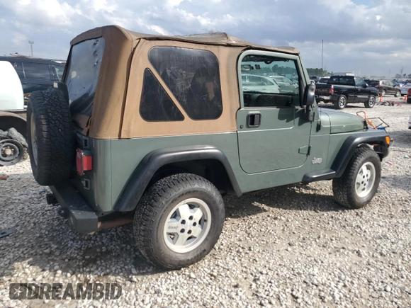 2000 Jeep Wrangler SE with VIN 1J4FA29P6YP753791, listed as a Copart auction lot 43945135 with 162,532 mi miles and Salvage Title. Bid and sale history available at carsss.com. Image 3.