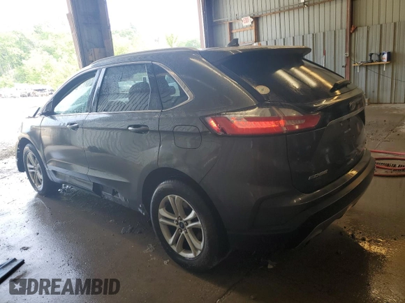 2019 Ford Edge SEL with VIN 2FMPK4J93KBC72097, listed as a Copart auction lot 59540395 with 85,891 mi miles and Salvage title. Bid and sale history available at DreamBid. Image 2.