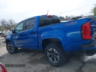 2021 Chevrolet Colorado 4WD Z71 z VIN 1GCGTDEN4M1212479, wystawiony jako IAAI lot #41937713 z przebiegiem 56 164 mil mil oraz . Historia ofert i sprzedaży dostępna na DreamBid. Obrazek 15.