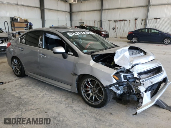 2016 Subaru WRX Premium z VIN JF1VA1E69G9828081, wystawiony jako Copart lot #63122085 z przebiegiem 52 984 mil mil oraz Szkoda całkowita • Salvage title. Historia ofert i sprzedaży dostępna na DreamBid. Obrazek 4.