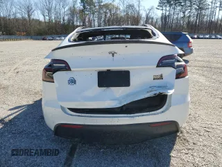 2024 Tesla Model Y Performance z VIN 7SAYGDEF5RF183755, wystawiony jako Copart lot #47230175 z przebiegiem Nie podano mil oraz Szkoda całkowita • Salvage title. Historia ofert i sprzedaży dostępna na DreamBid. Obrazek 6.
