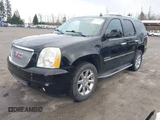 2011 GMC Yukon Denali with VIN 1GKS2EEF9BR261336, listed as a IAAI auction lot 41796533 with 149,808 mi miles. Bid and sale history available at carsss.com. Image 19.