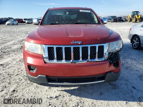 2011 Jeep Grand Cherokee Overland with VIN 1J4RS6GG7BC665979, listed as a Copart auction lot 83394214 with 216,988 mi miles and Salvage Title. Bid and sale history available at DreamBid. Image 5.