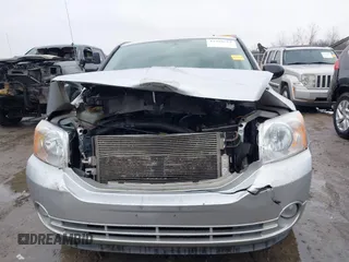 2011 Dodge Caliber Mainstreet with VIN 1B3CB3HA3BD234264, listed as a IAAI auction lot 41998567 with 132,687 mi miles and . Bid and sale history available at DreamBid. Image 13.