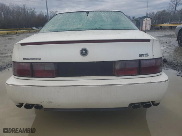 1997 Cadillac Seville Touring STS with VIN 1G6KY5292VU818343, listed as a Copart auction lot 86368564 with 0 mi miles and Non Repairable. Bid and sale history available at carsss.com. Image 6.