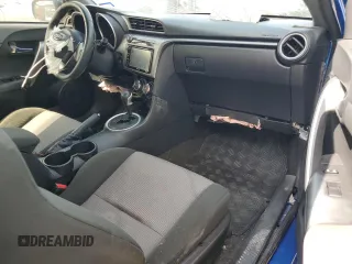 2016 Scion tC z VIN JTKJF5C78GJ016405, wystawiony jako Copart lot #54265995 z przebiegiem 89 467 mil mil oraz Szkody całkowita. Historia ofert i sprzedaży dostępna na DreamBid. Obrazek 11.