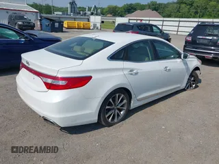 2015 Hyundai Azera z VIN KMHFG4JG3FA447672, wystawiony jako IAAI lot #42474930 z przebiegiem 125 425 mil mil oraz . Historia ofert i sprzedaży dostępna na DreamBid. Obrazek 4.