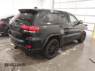 2019 Jeep Grand Cherokee Laredo E with VIN 1C4RJFAG6KC819518, listed as a IAAI auction lot 41856979 with 49,155 mi miles. Bid and sale history available at carsss.com. Image 4.