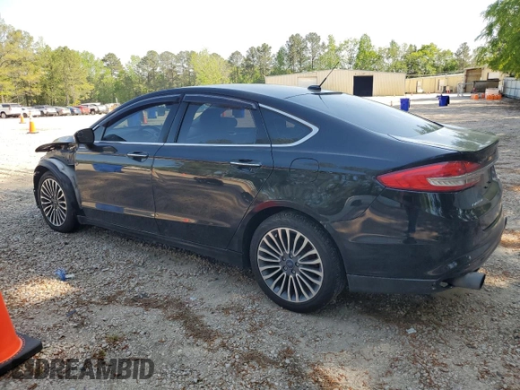 2017 Ford Fusion SE z VIN 3FA6P0H98HR328552, wystawiony jako Copart lot #52709395 z przebiegiem 188 451 mil mil oraz Szkoda całkowita • Salvage title. Historia ofert i sprzedaży dostępna na DreamBid. Obrazek 2.