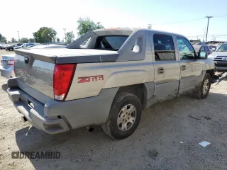 2002 Chevrolet Avalanche z VIN 3GNEC13T32G329497, wystawiony jako Copart lot #59164275 z przebiegiem 174 500 mil mil oraz Szkoda całkowita • Salvage title. Historia ofert i sprzedaży dostępna na DreamBid. Obrazek 3.