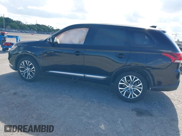 2018 Mitsubishi Outlander SE with VIN JA4AD3A33JZ055813, listed as a IAAI auction lot 41232885 with 126,457 mi miles and . Bid and sale history available at DreamBid. Image 3.