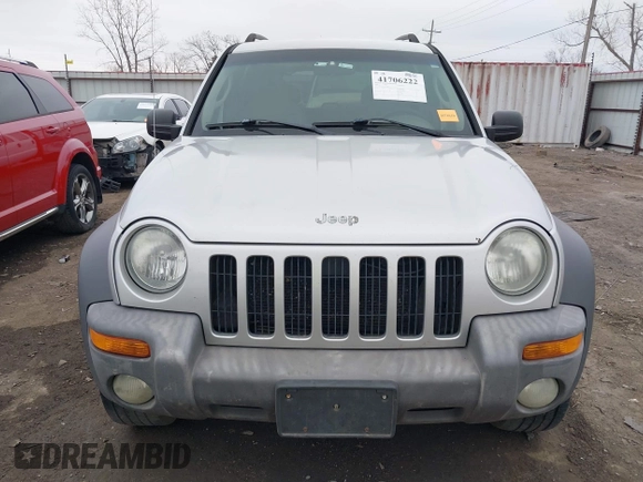 2004 Jeep Liberty Sport with VIN 1J4GL48K74W318861, listed as a IAAI auction lot 41706222 with 211,089 mi miles. Bid and sale history available at carsss.com. Image 12.