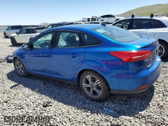 2018 Ford Focus SE z VIN 1FADP3FE1JL246725, wystawiony jako Copart lot #57913225 z przebiegiem 52 247 mil mil oraz Czysty tytuł • Clean title. Historia ofert i sprzedaży dostępna na DreamBid. Obrazek 2.