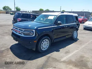 2023 Ford Bronco Sport Heritage with VIN 3FMCR9G6XPRD41896, listed as a IAAI auction lot 42459929 with 22,952 mi miles and . Bid and sale history available at DreamBid. Image 2.