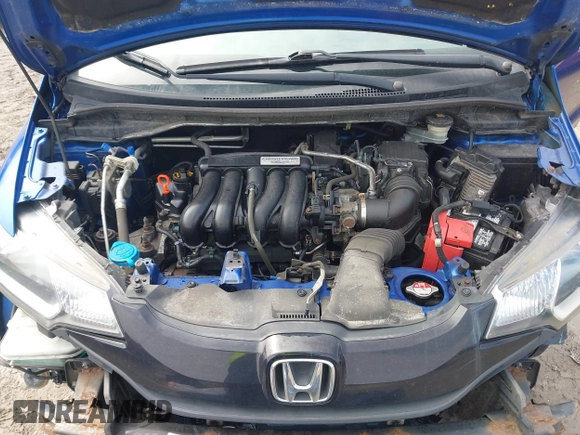 2015 Honda Fit LX with VIN 3HGGK5H52FM710434, listed as a IAAI auction lot 42022022 with 104,118 mi miles. Bid and sale history available at carsss.com. Image 10.