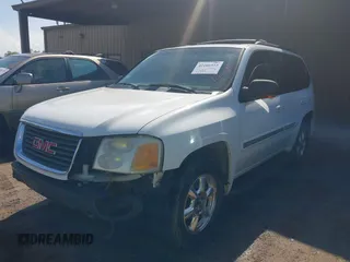 2003 GMC Envoy SLT with VIN 1GKDT13S432190085, listed as a IAAI auction lot 42106915 with 289,933 mi miles. Bid and sale history available at carsss.com. Image 2.