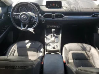 2018 Mazda CX-5 Touring z VIN JM3KFBCM2J1363310, wystawiony jako Copart lot #58969135 z przebiegiem 86 831 mil mil oraz Szkoda całkowita • Salvage title. Historia ofert i sprzedaży dostępna na DreamBid. Obrazek 8.