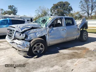 2017 GMC Sierra 1500 SLE with VIN 3GTU2MEC7HG347645, listed as a Copart auction lot 74119884 with 151,285 mi miles and Salvage Title. Bid and sale history available at DreamBid. Image 1.