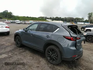 2023 Mazda CX-5 2.5 S Carbon Edition with VIN JM3KFBCM1P0209900, listed as a IAAI auction lot 37342913 with 3,853 mi miles. Bid and sale history available at carsss.com. Image 3.