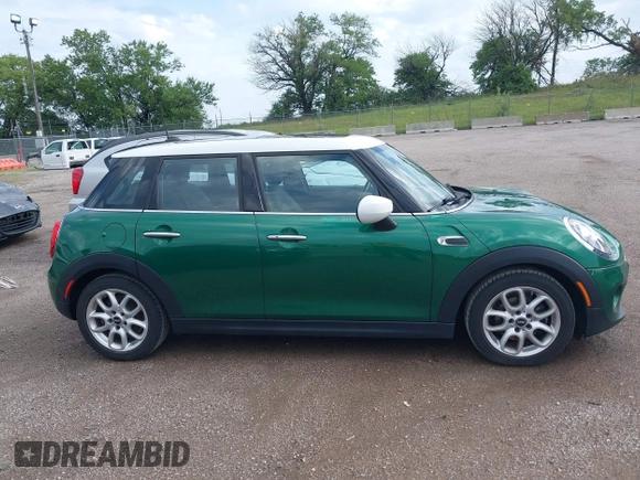 2020 MINI Hardtop 4 Door Cooper with VIN WMWXU7C03L2L46525, listed as a IAAI auction lot 42585895 with 42,864 mi miles and . Bid and sale history available at DreamBid. Image 14.
