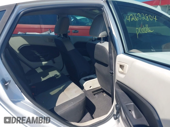 2013 Ford Fiesta S with VIN 3FADP4AJ7DM184180, listed as a IAAI auction lot 42632804 with 176,729 mi miles and . Bid and sale history available at DreamBid. Image 8.