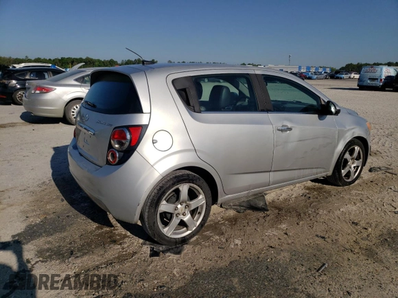 2012 Chevrolet Sonic LTZ z VIN 1G1JE6SH4C4101608, wystawiony jako Copart lot #53111725 z przebiegiem 203 012 mil mil oraz Szkoda całkowita • Salvage title. Historia ofert i sprzedaży dostępna na DreamBid. Obrazek 3.