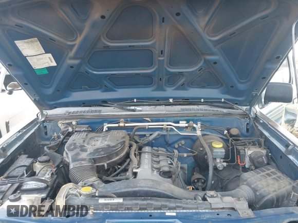 2003 Nissan Frontier XE with VIN 1N6DD26T13C471349, listed as a IAAI auction lot 41215142 with 112,192 mi miles and . Bid and sale history available at DreamBid. Image 10.