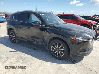 2018 Mazda CX-5 Touring with VIN JM3KFACM0J1408075, listed as a Copart auction lot 50866735 with Not Provided miles and Salvage Title. Bid and sale history available at carsss.com. Image 4.