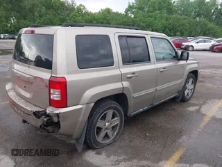 2010 Jeep Patriot Sport with VIN 1J4NF2GB7AD585140, listed as a IAAI auction lot 42219810 with 111,819 mi miles and . Bid and sale history available at carsss.com. Image 4.