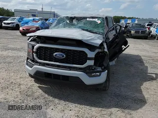 2023 Ford F-150 XL z VIN 1FTEW1CP6PKD50959, wystawiony jako Copart lot #58478275 z przebiegiem Nie podano mil oraz Nie do naprawy • Non repairable. Historia ofert i sprzedaży dostępna na DreamBid. Obrazek 13.