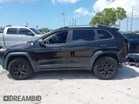 2017 Jeep Cherokee Trailhawk with VIN 1C4PJMBS9HW537962, listed as a IAAI auction lot 42002460 with 129,037 mi miles and . Bid and sale history available at DreamBid. Image 15.