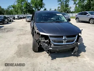 2017 Dodge Journey SE with VIN 3C4PDCAB6HT621987, listed as a Copart auction lot 52559305 with 169,468 mi miles and Salvage Title. Bid and sale history available at DreamBid. Image 14.