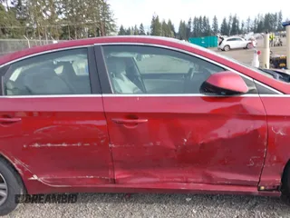 2016 Hyundai Sonata SE with VIN 5NPE24AF0GH261359, listed as a IAAI auction lot 42005720 with 100,889 mi miles and . Bid and sale history available at carsss.com. Image 13.